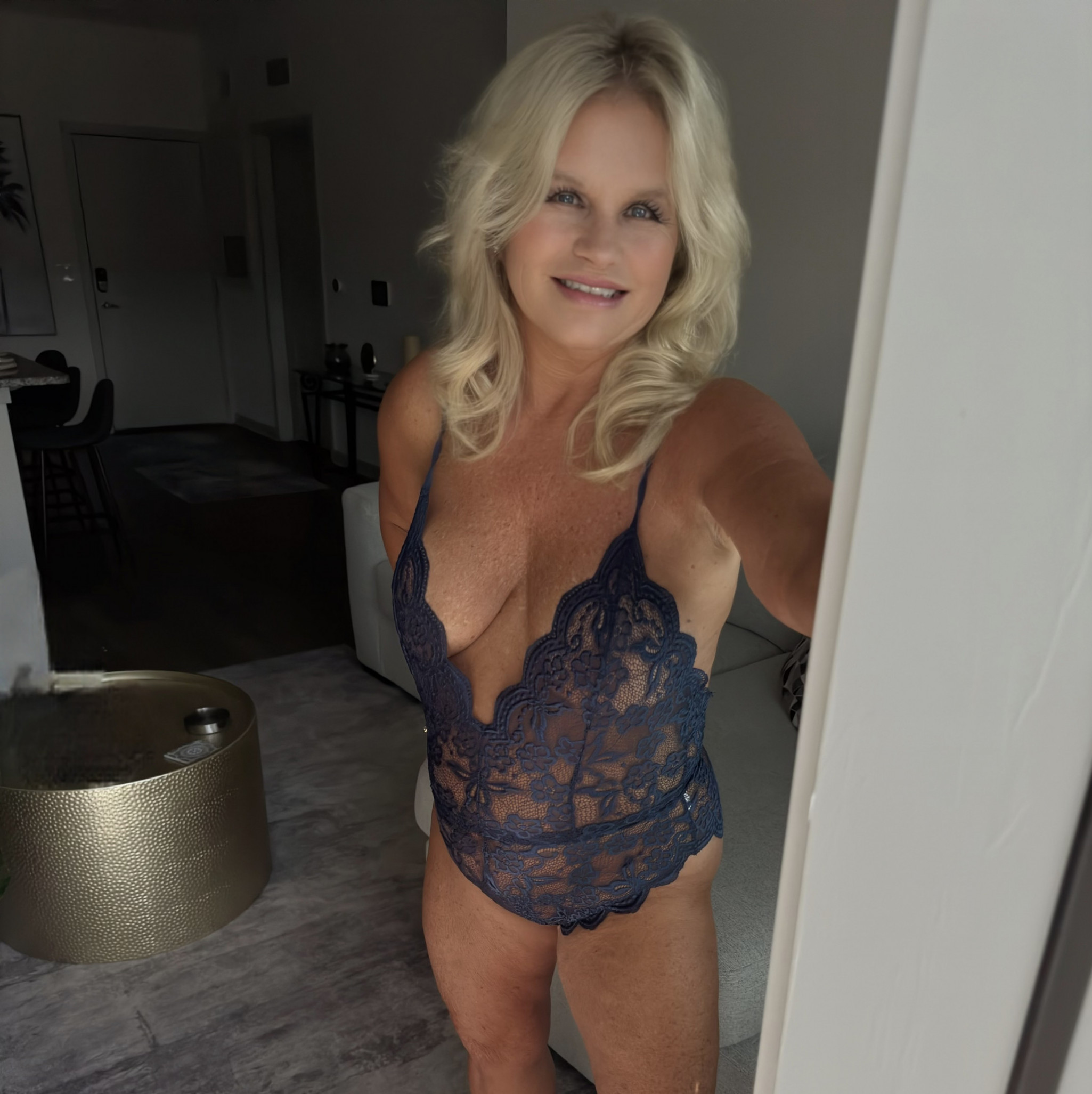Blue lace bodysuit with plunge front